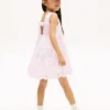 Vestido infantil com laço bordado e ilhós