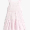 Vestido infantil com laço bordado e ilhós