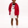 Vestido-macacão em Hilfiger Denim com emblema Hilfiger para criança Vestido-macacão em Hilfiger Denim com emblema Hilfiger para criança