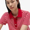 Vestido polo interlock às riscas com botões dourados Vestido polo interlock às riscas com botões dourados